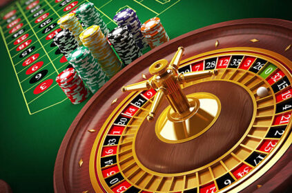 Roulette wheel and casino chips on the table.Similar images: