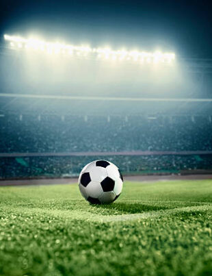 View of soccer ball on athletic field in stadium arena
